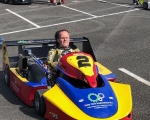Liam Fox, getting “in the zone” before the Superkarts race.(S3)